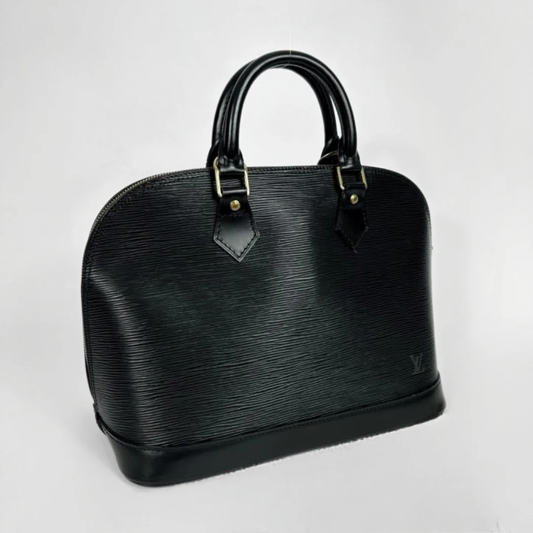 Louis Vuitton Alma in Black Epi Leather on a white
