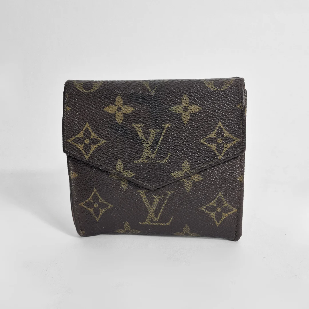 Louis Vuitton wallet with monogram pattern on a white background