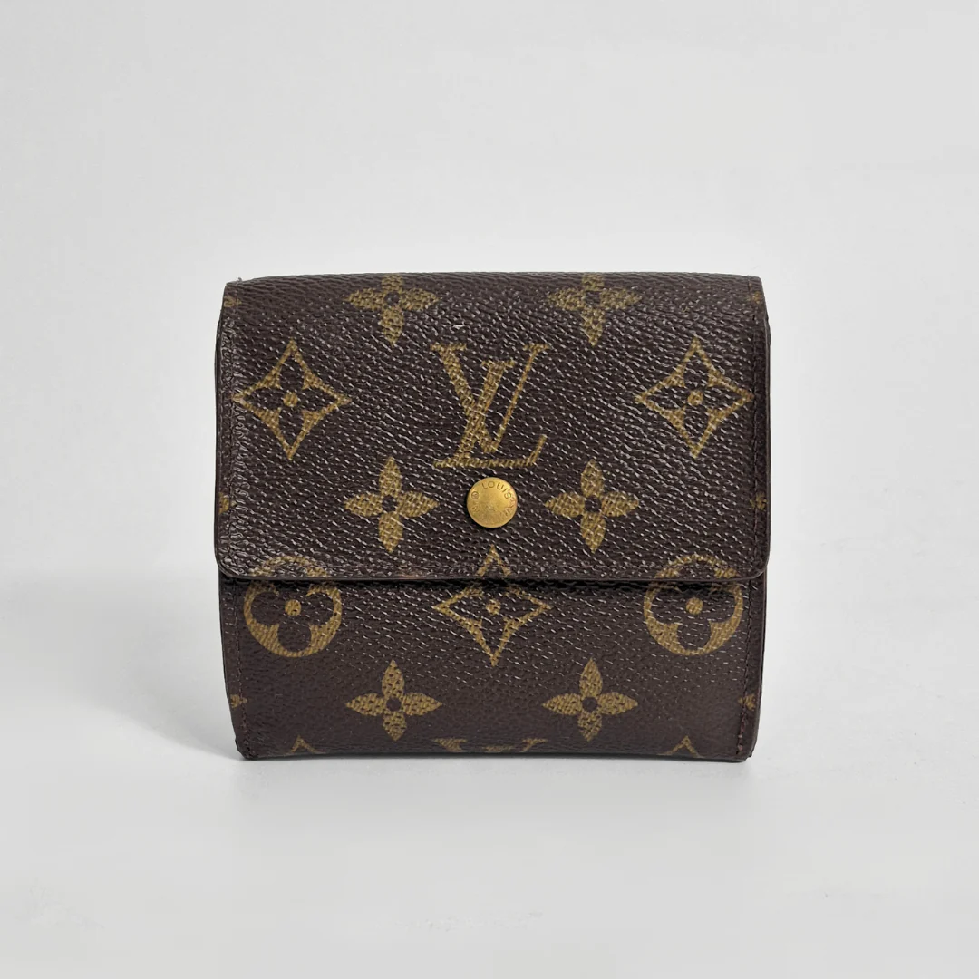 Louis Vuitton wallet with monogram pattern on a white background