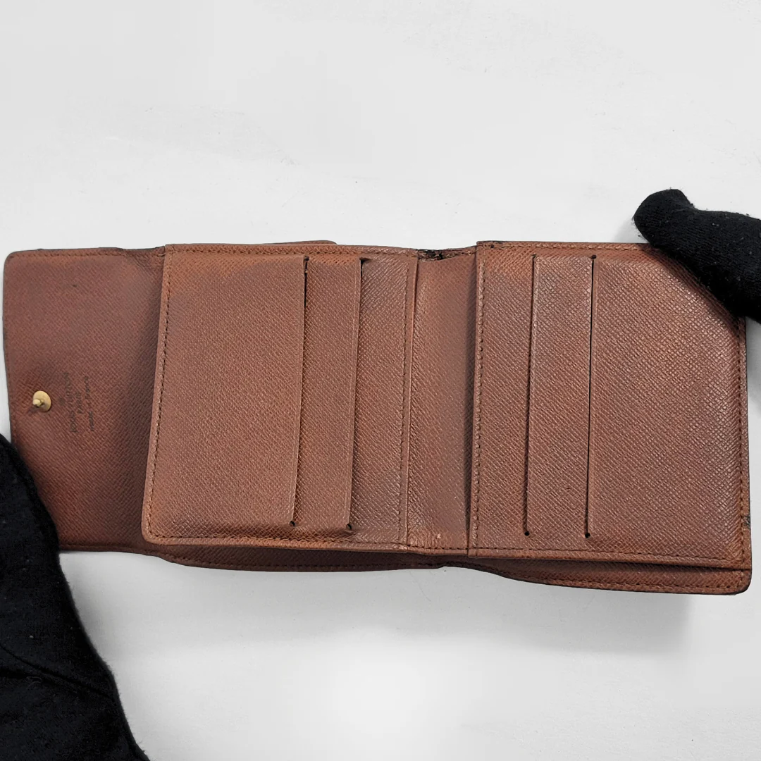 Brown leather wallet on a white background