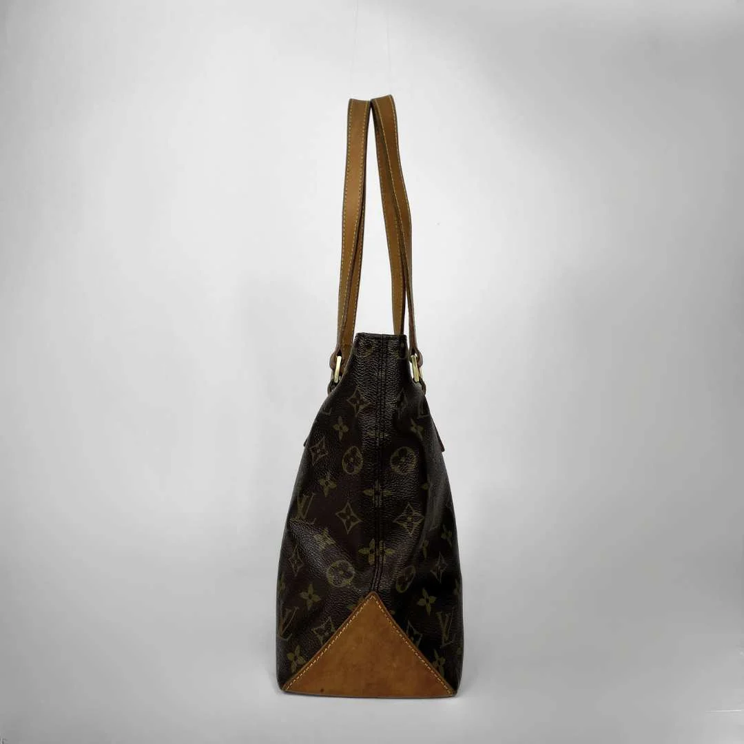 A Louis Vuitton monogram canvas shoulder bag with tan leather trim and straps, shown against a neutral light gray background.