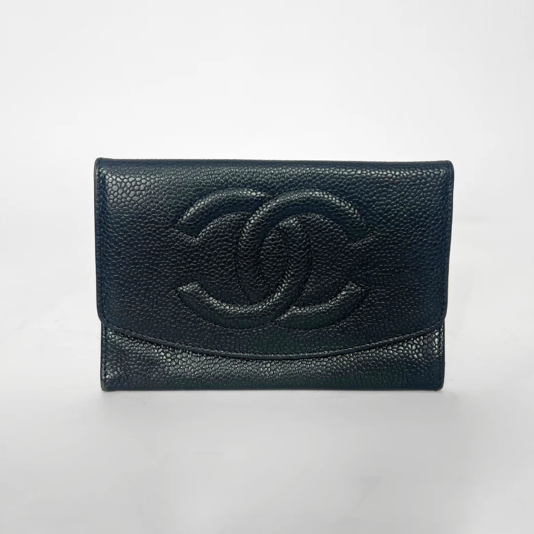 Black leather wallet with Chanel logo on a white background