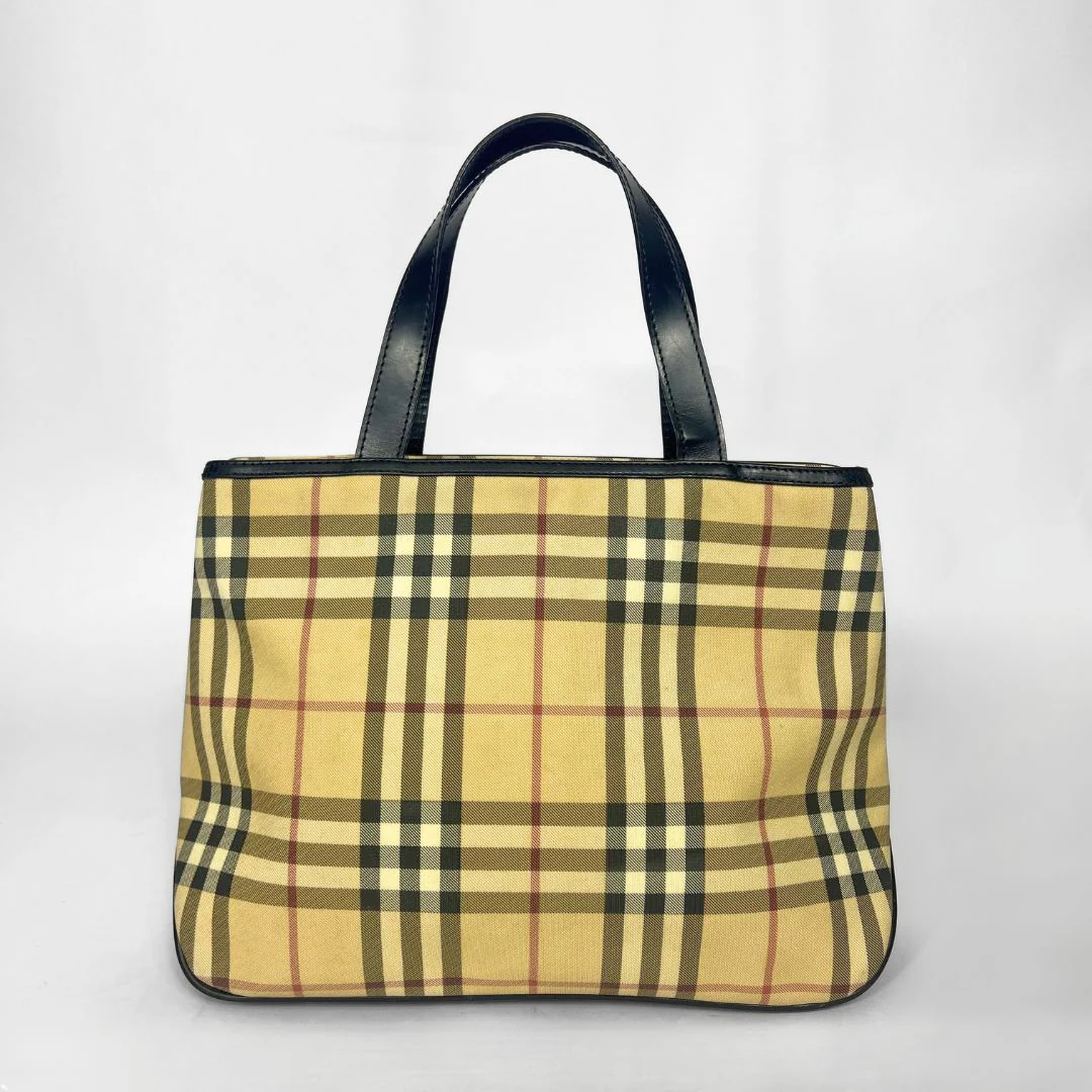Plaid tote bag with black handles on a white background
