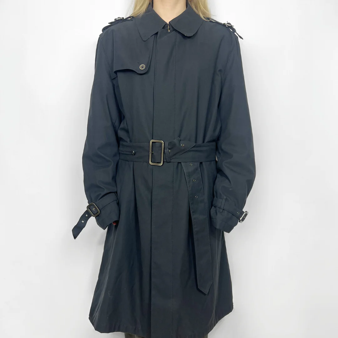 Dark gray trench coat with a belt on a white background