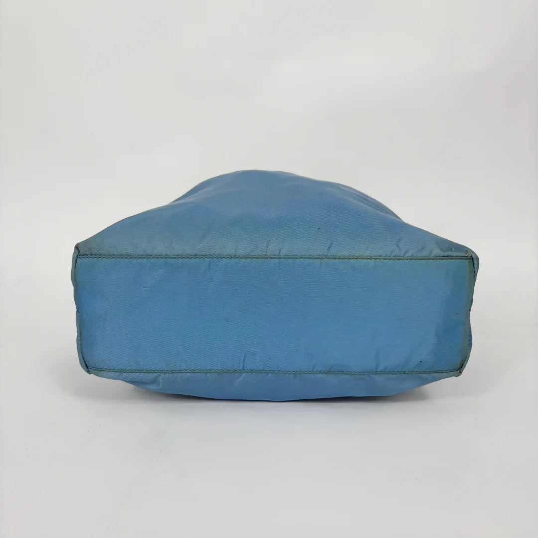 Blue bean bag chair on a white background