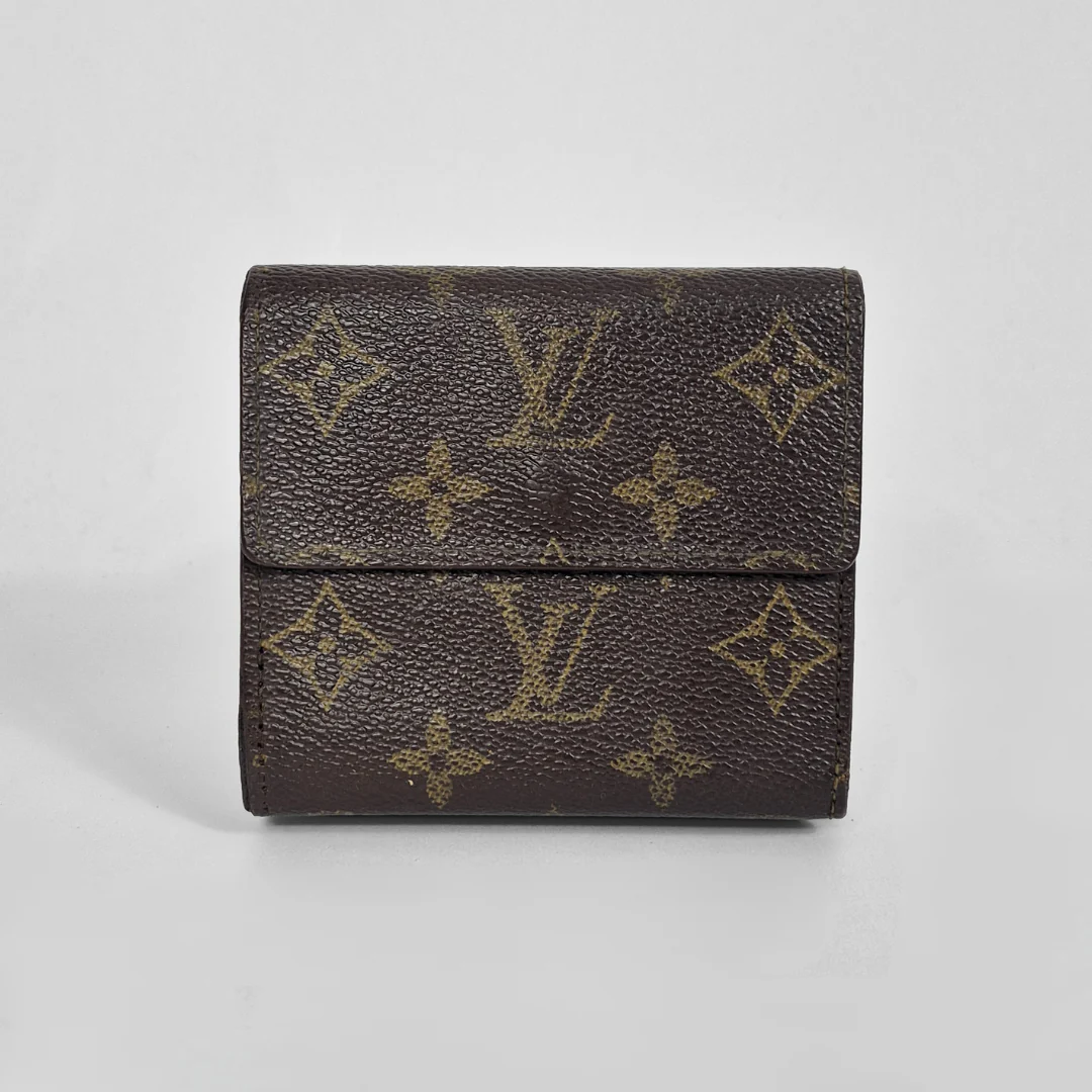 Brown wallet with monogram pattern on a light gray background