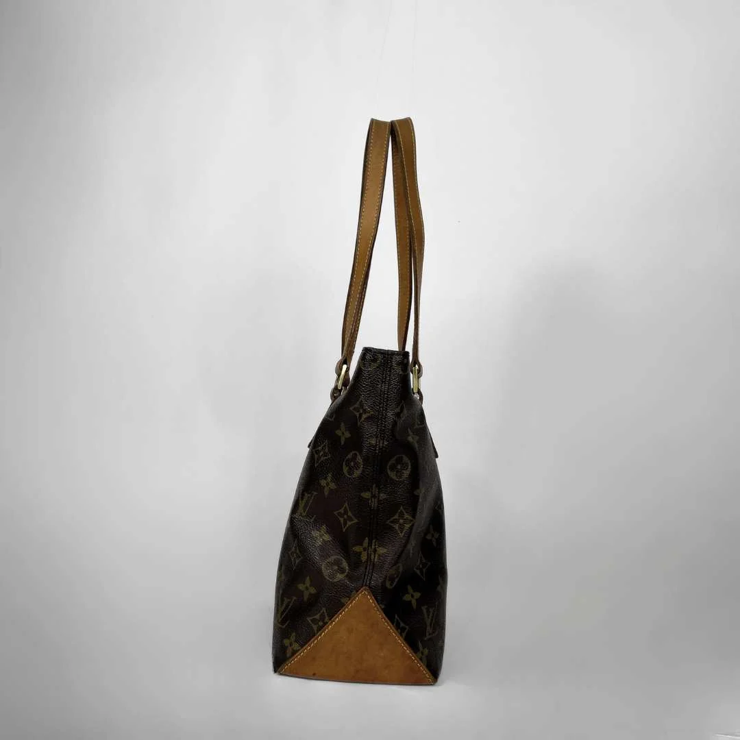 Louis Vuitton monogram canvas shoulder bag with brown leather trim and straps, shown against a plain light gray background.