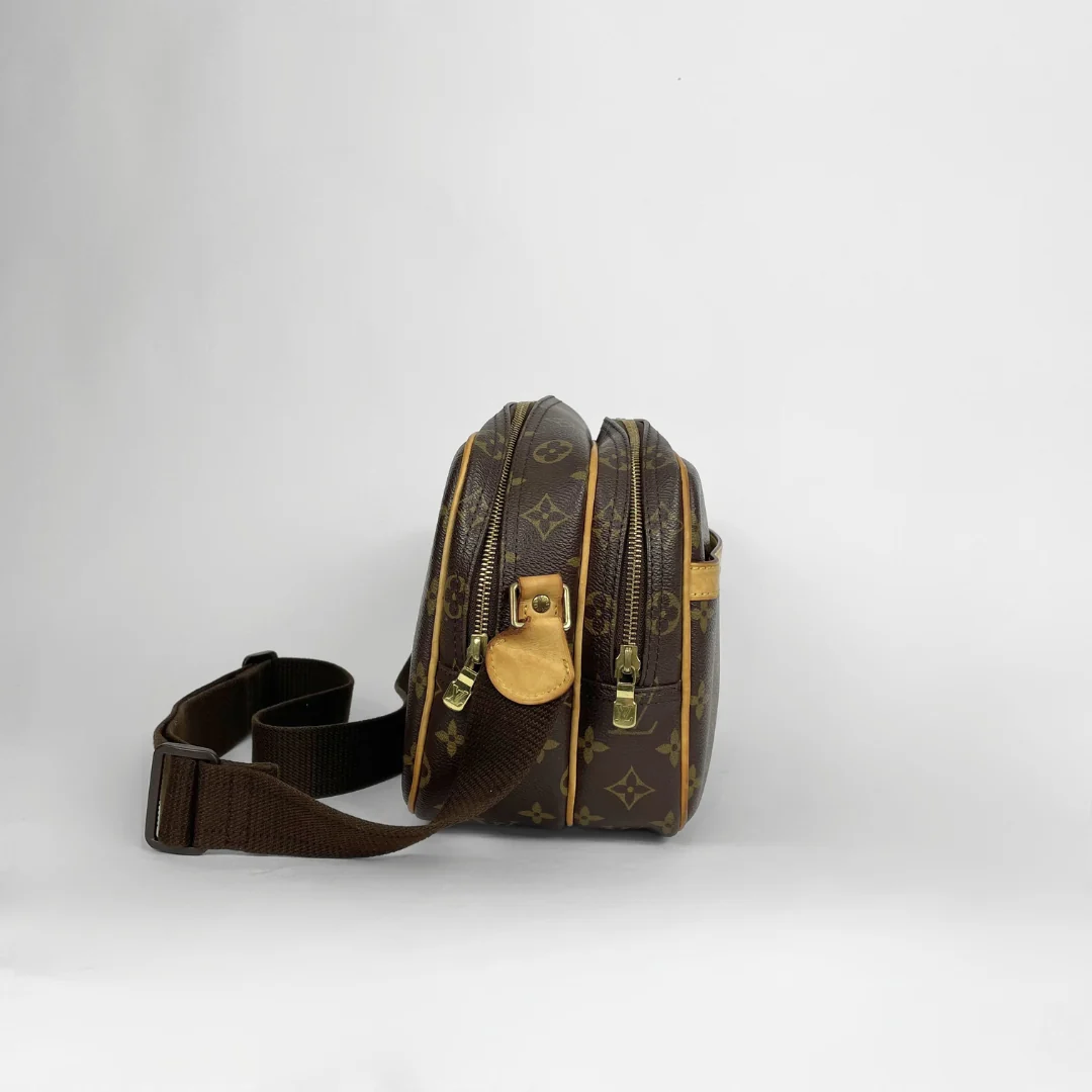 Louis Vuitton Reporter PM Monogram Canvas on a white background