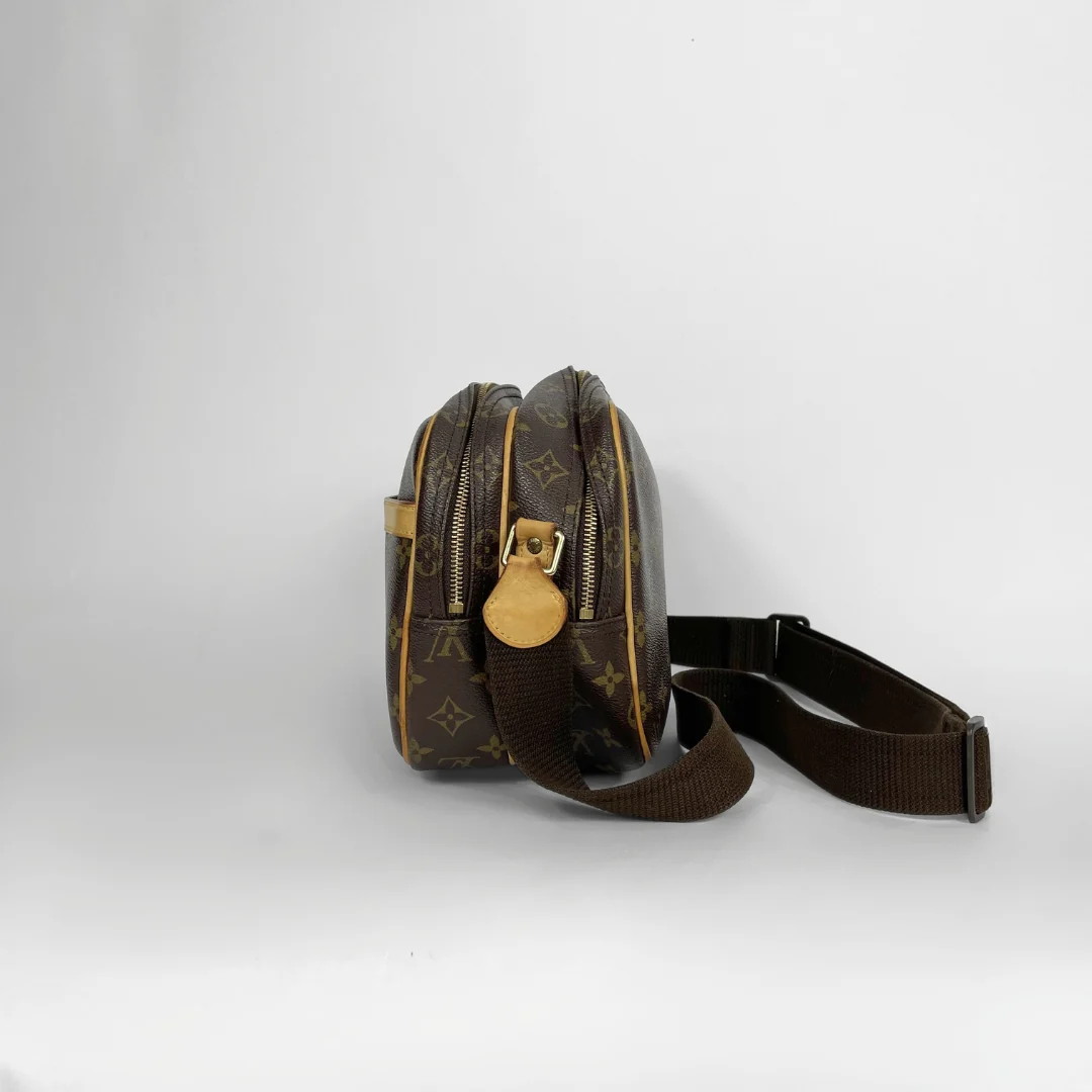Louis Vuitton Reporter PM Monogram Canvas on a white background