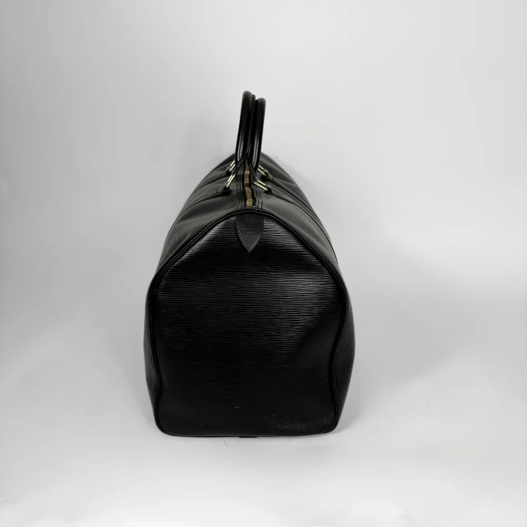 Black handbag on a white background
