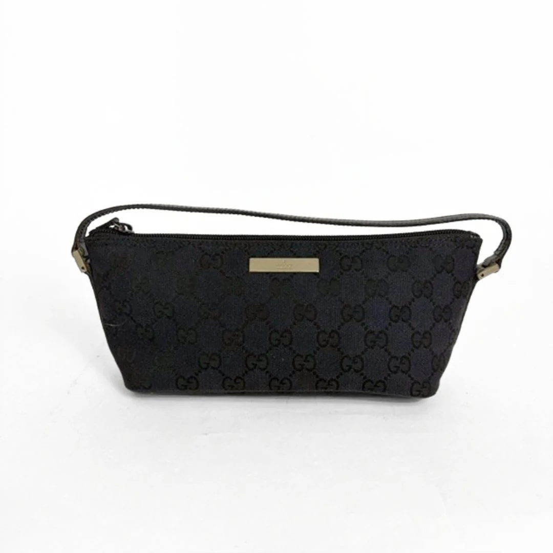 Black quilted handbag with brand logo on a white background