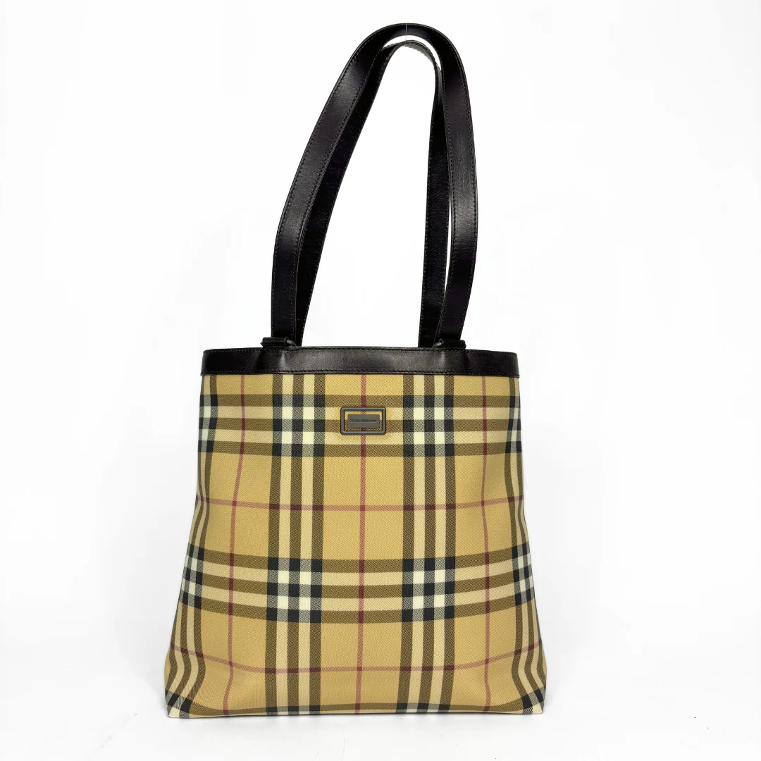 Beige checkered tote bag with black handle on a white background