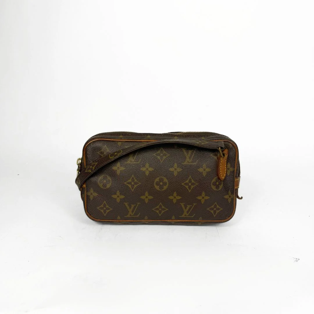 Brown monogram handbag on a white background