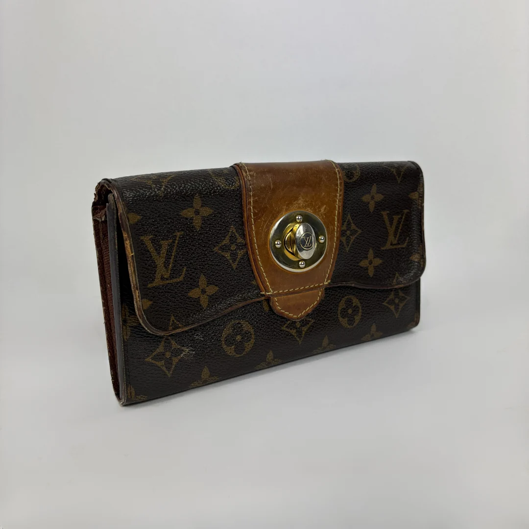 Louis Vuitton Wallet in front of white background