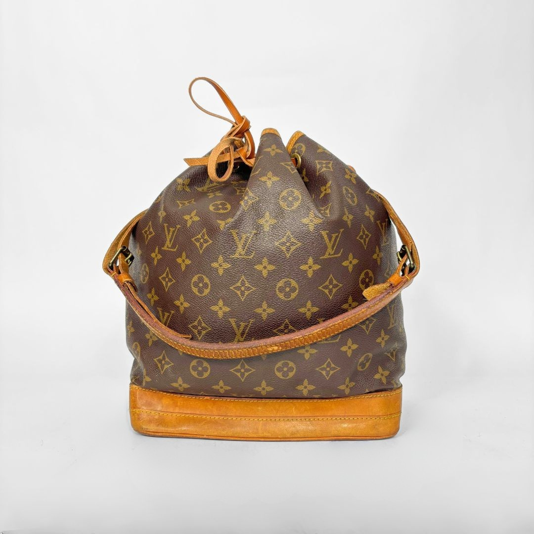 Brown monogram LV handbag with tan leather accents on a white background