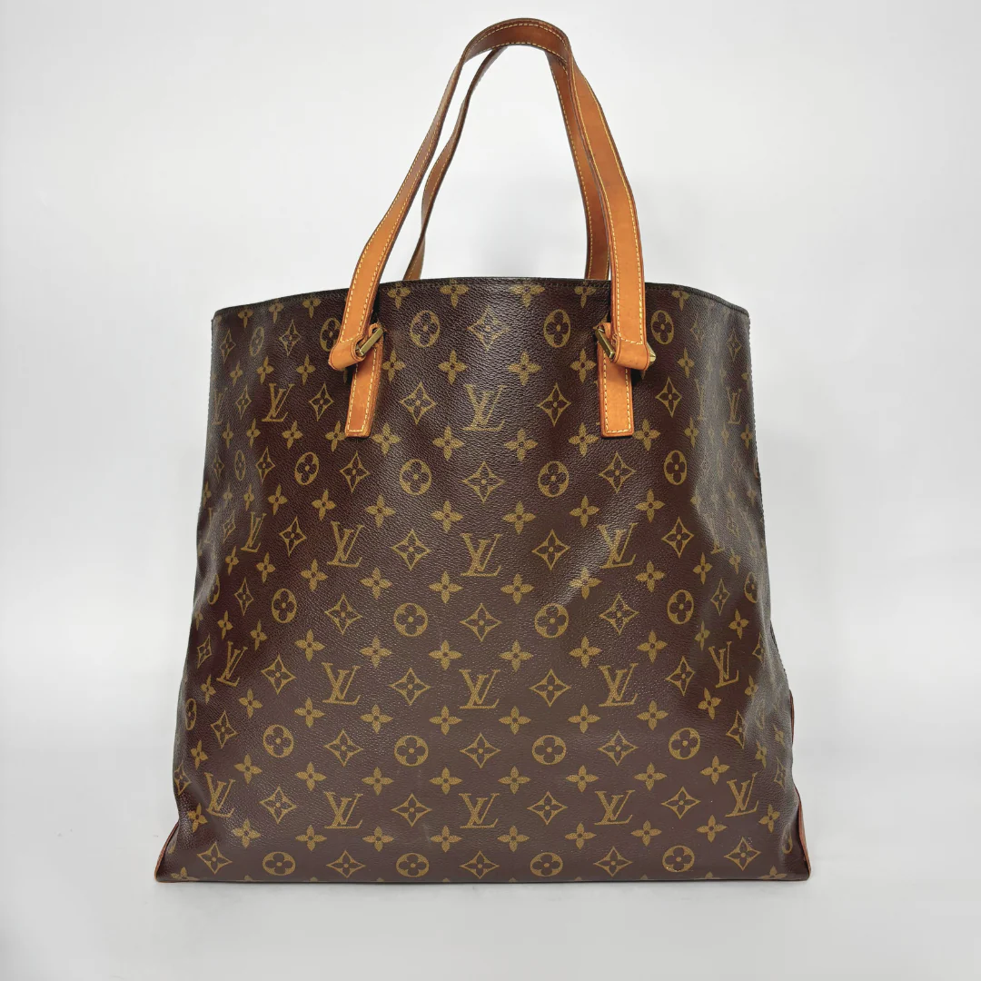 Brown Louis Vuitton bag with monogram pattern on a white background