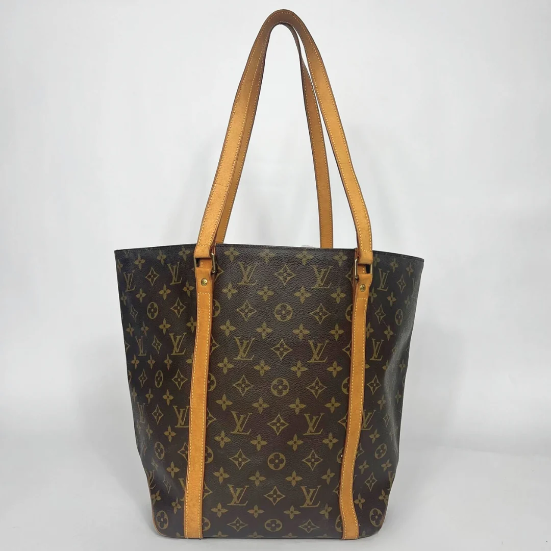Louis Vuitton Shopper in brown Monogram Canvas on a White Background