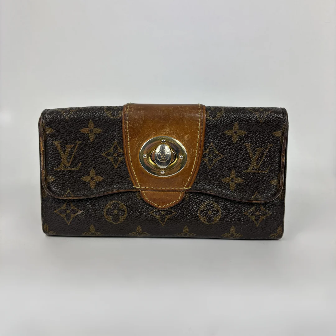 Louis Vuitton Wallet in front of white background