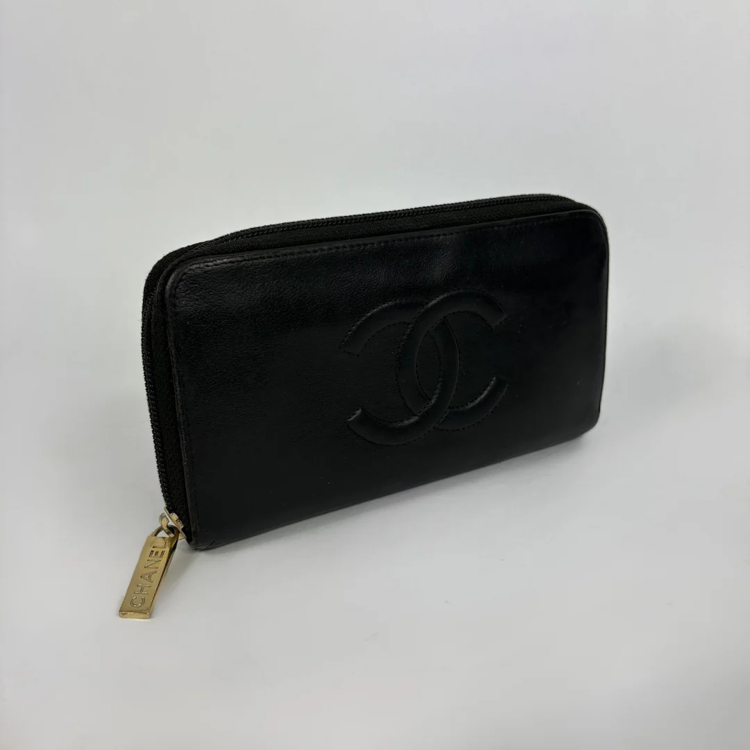 Black Chanel Wallet on white background