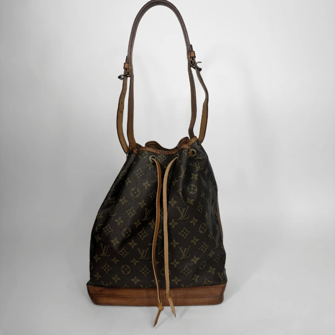 Louis Vuitton Petit Noe Monogram Canvas on a white background