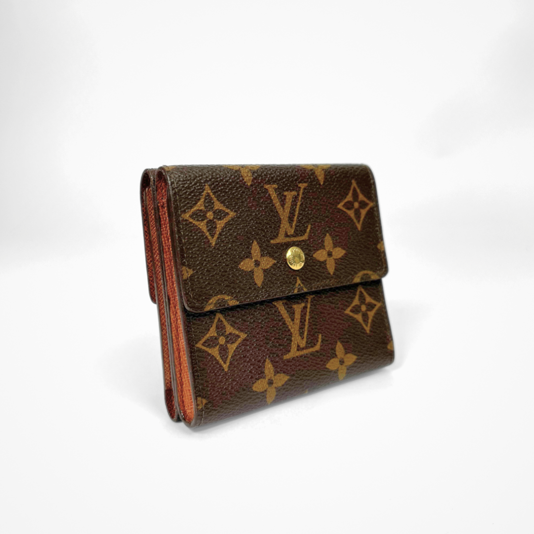 Louis Vuitton Druk Wallet on a white background