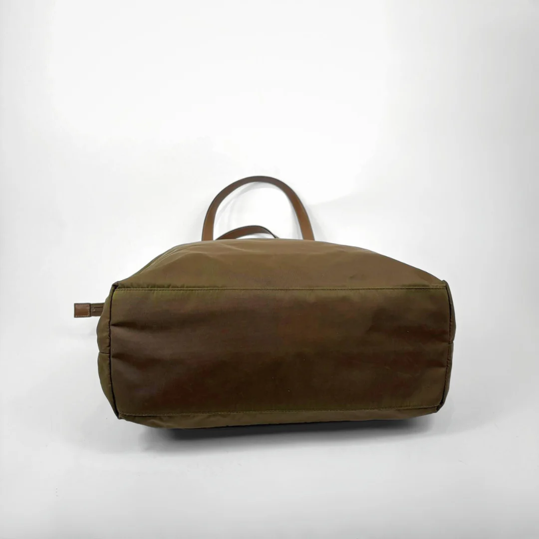 Brown duffel bag on a white background