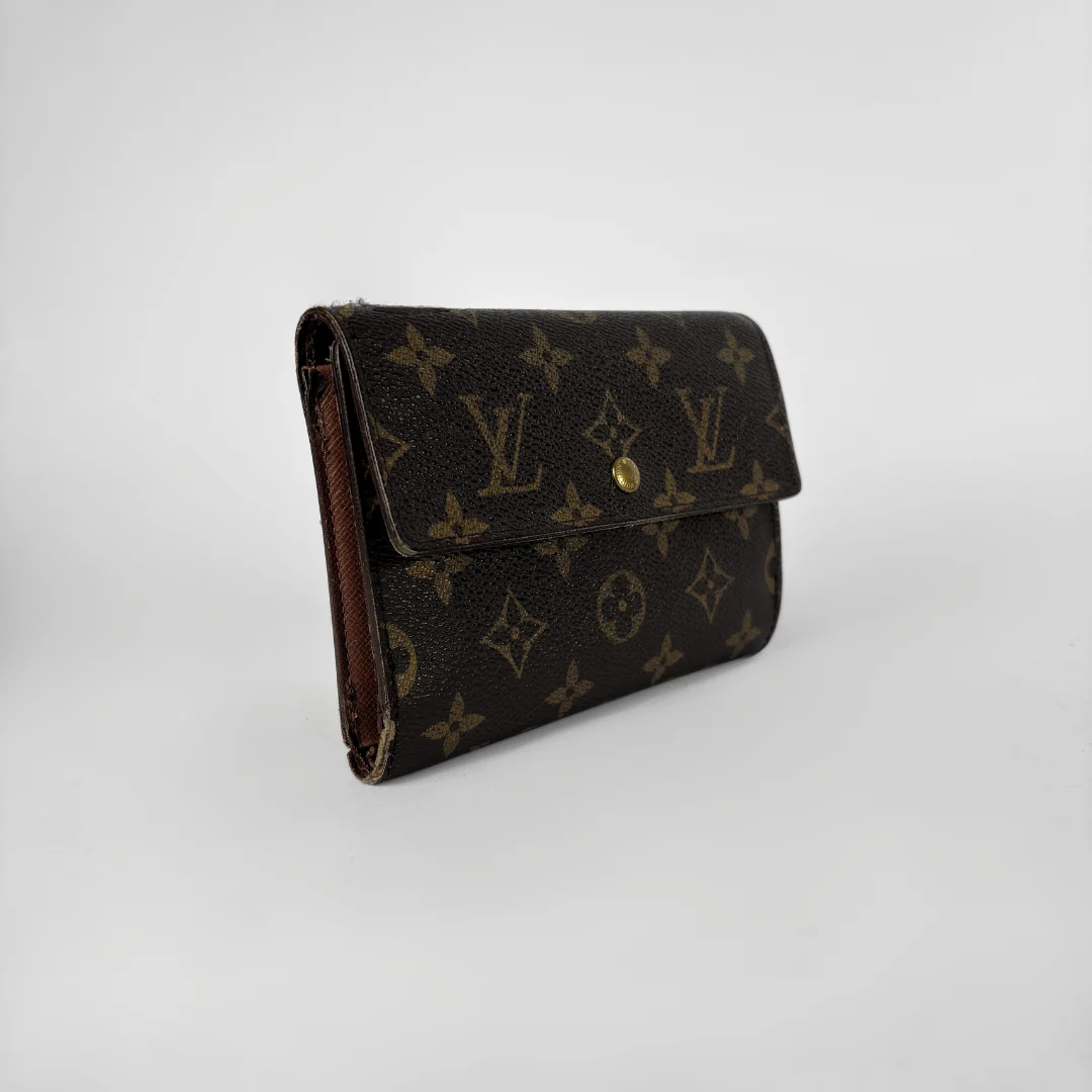 Louis Vuitton International Wallet Medium on a white background
