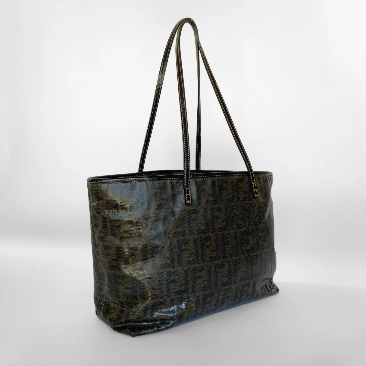 Black patterned tote bag on a white background