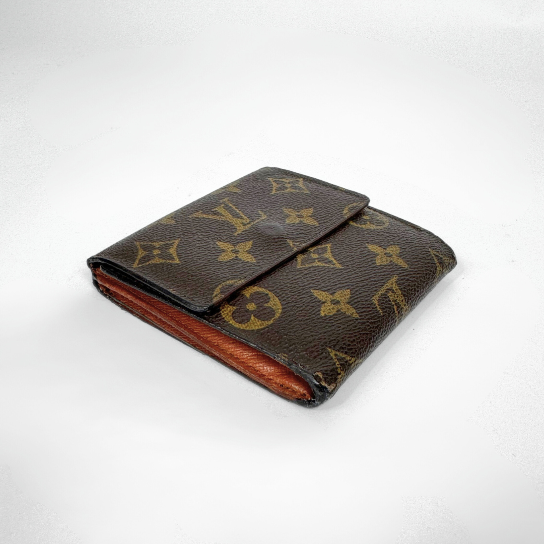 Louis Vuitton wallet with monogram pattern on a white background