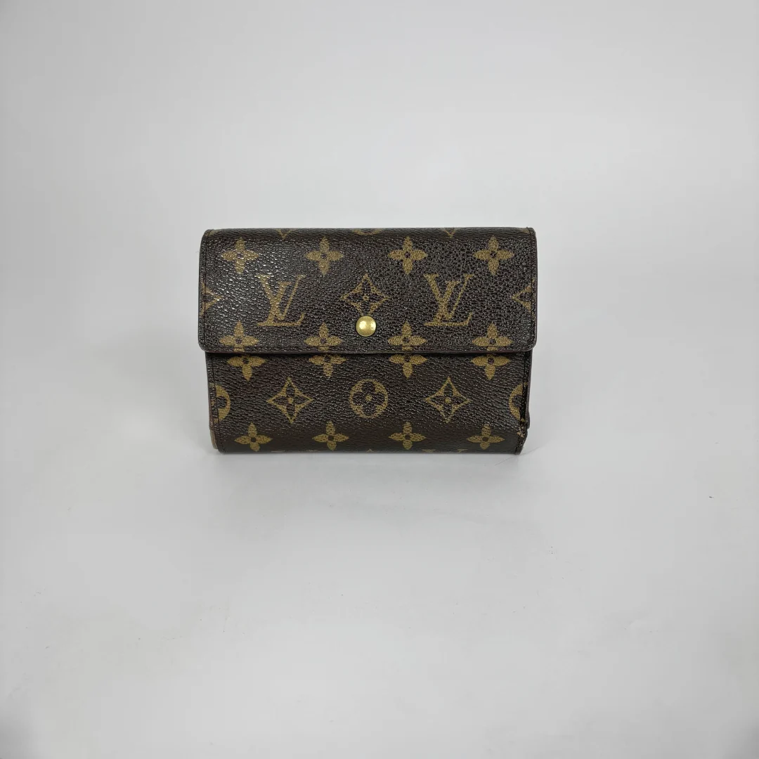 Louis Vuitton Wallet International on a white background