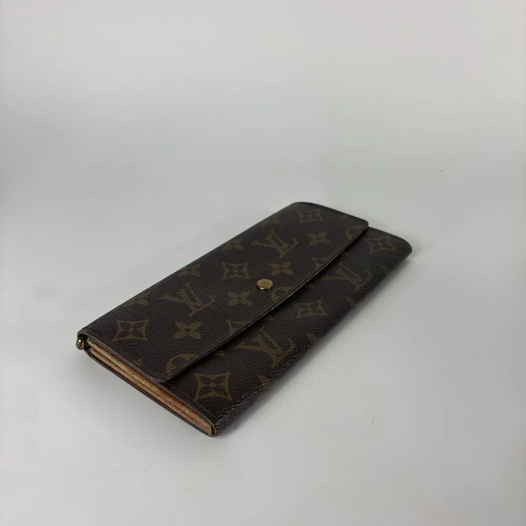 Louis Vuitton wallet on white background