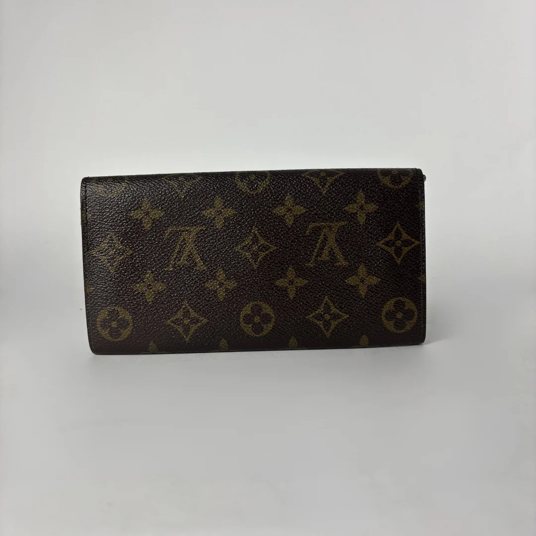 Louis Vuitton wallet on white background