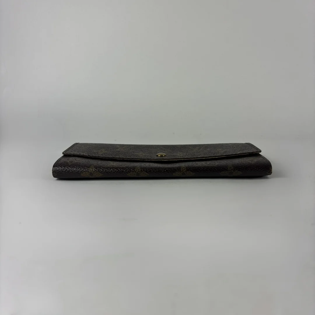 Louis Vuitton wallet on white background
