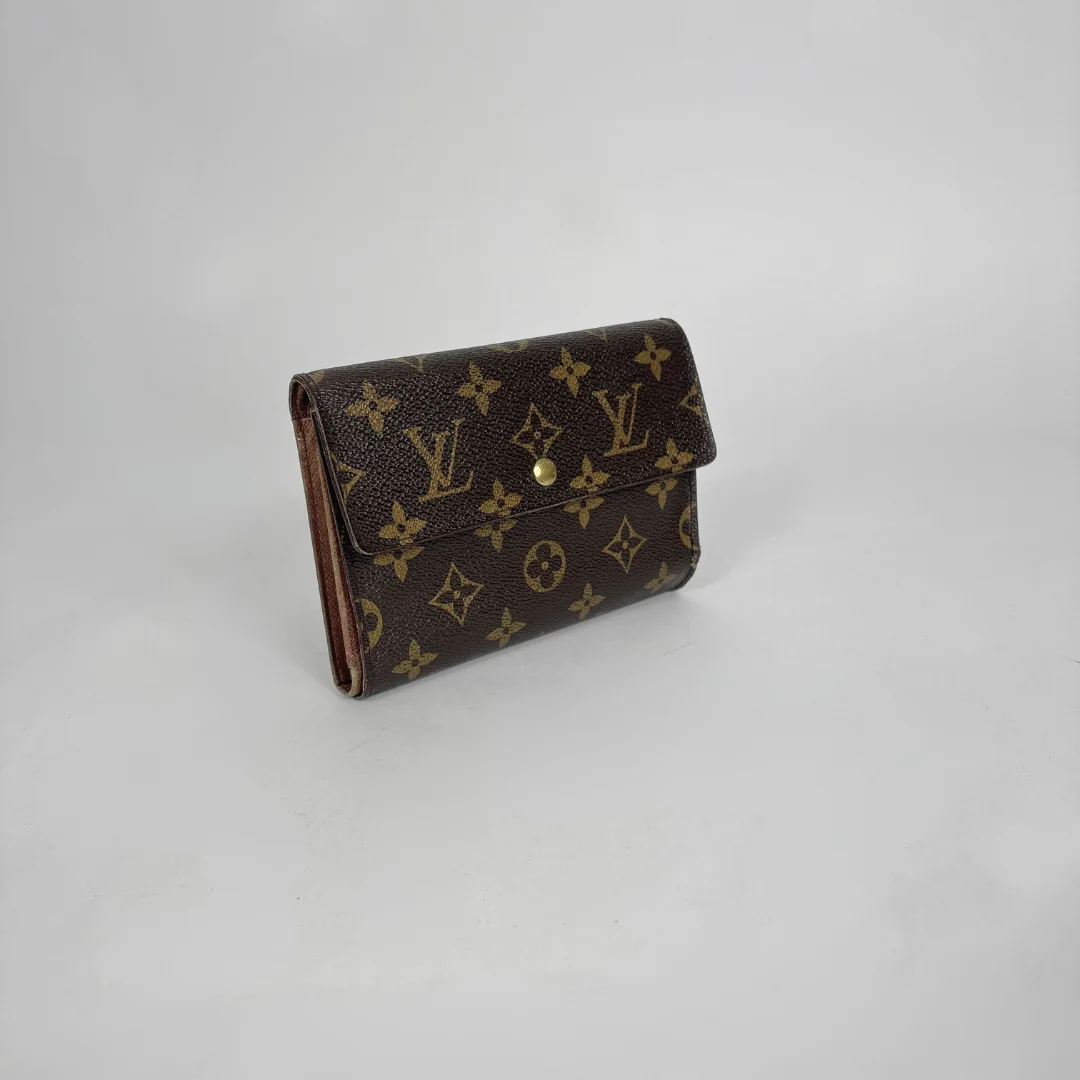 Louis Vuitton Wallet International on a white background