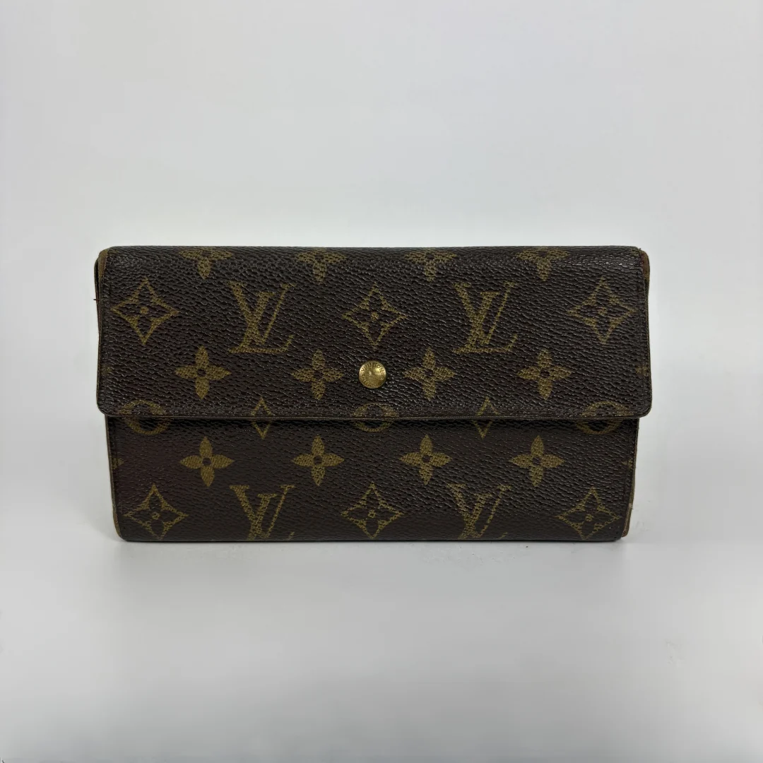 Louis Vuitton wallet on white background