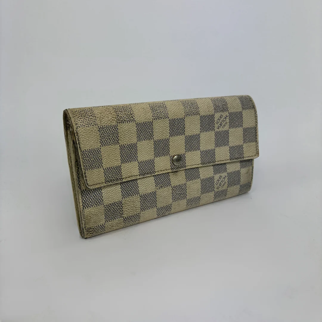Louis Vuitton wallet on white background