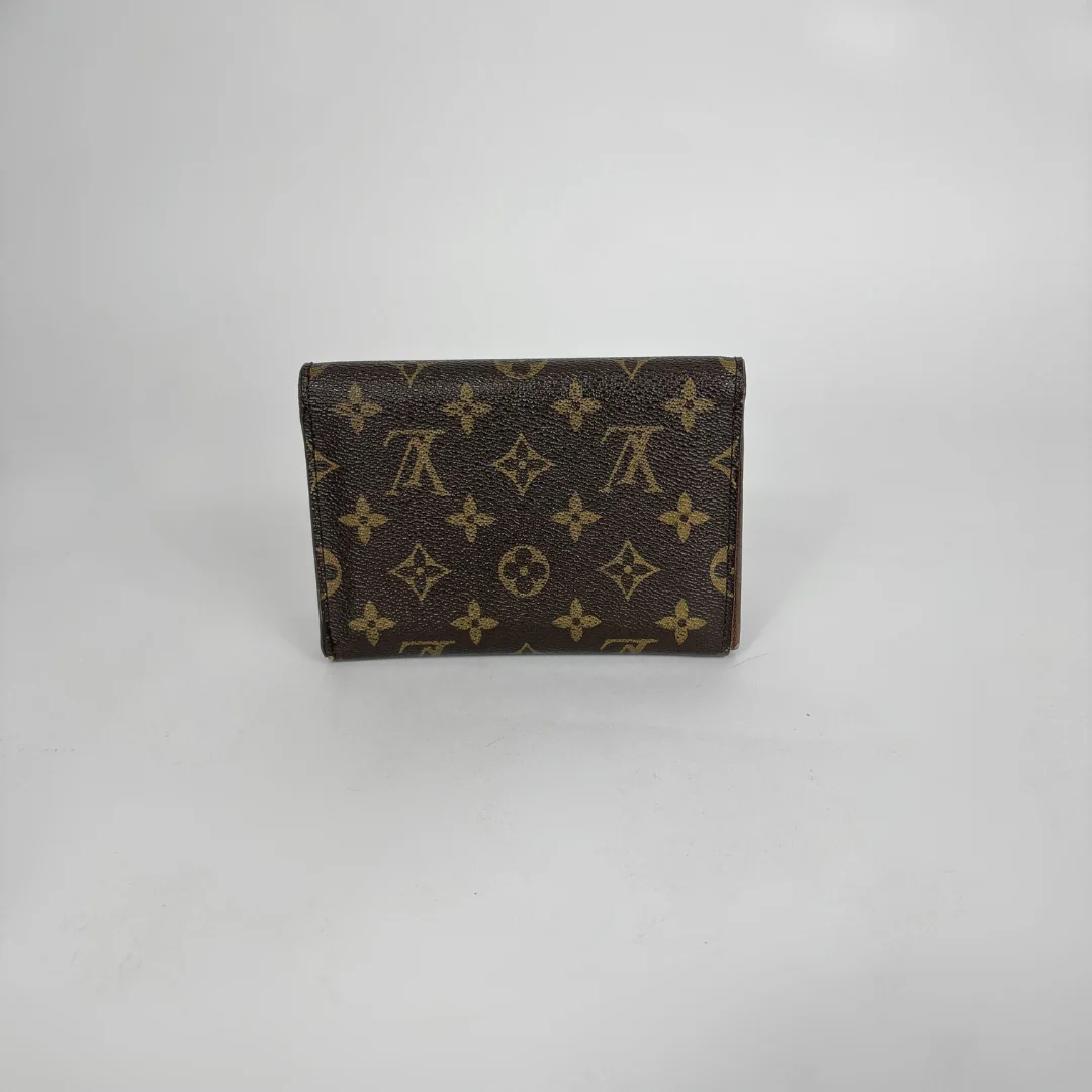 Louis Vuitton Wallet International on a white background