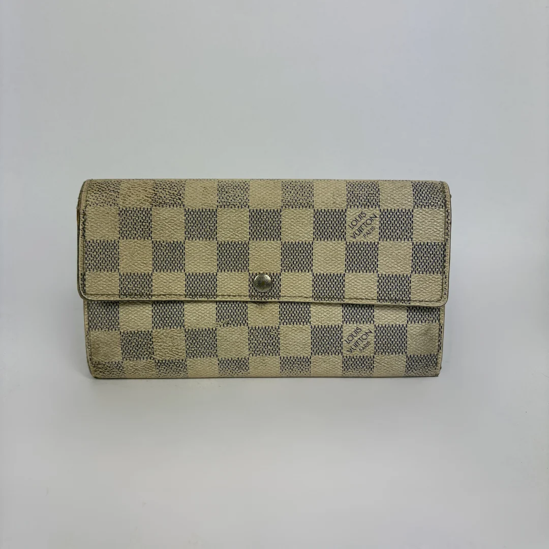 Louis Vuitton wallet on white background