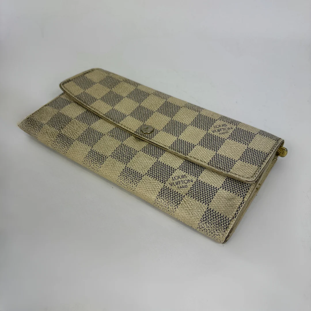 Louis Vuitton wallet on white background