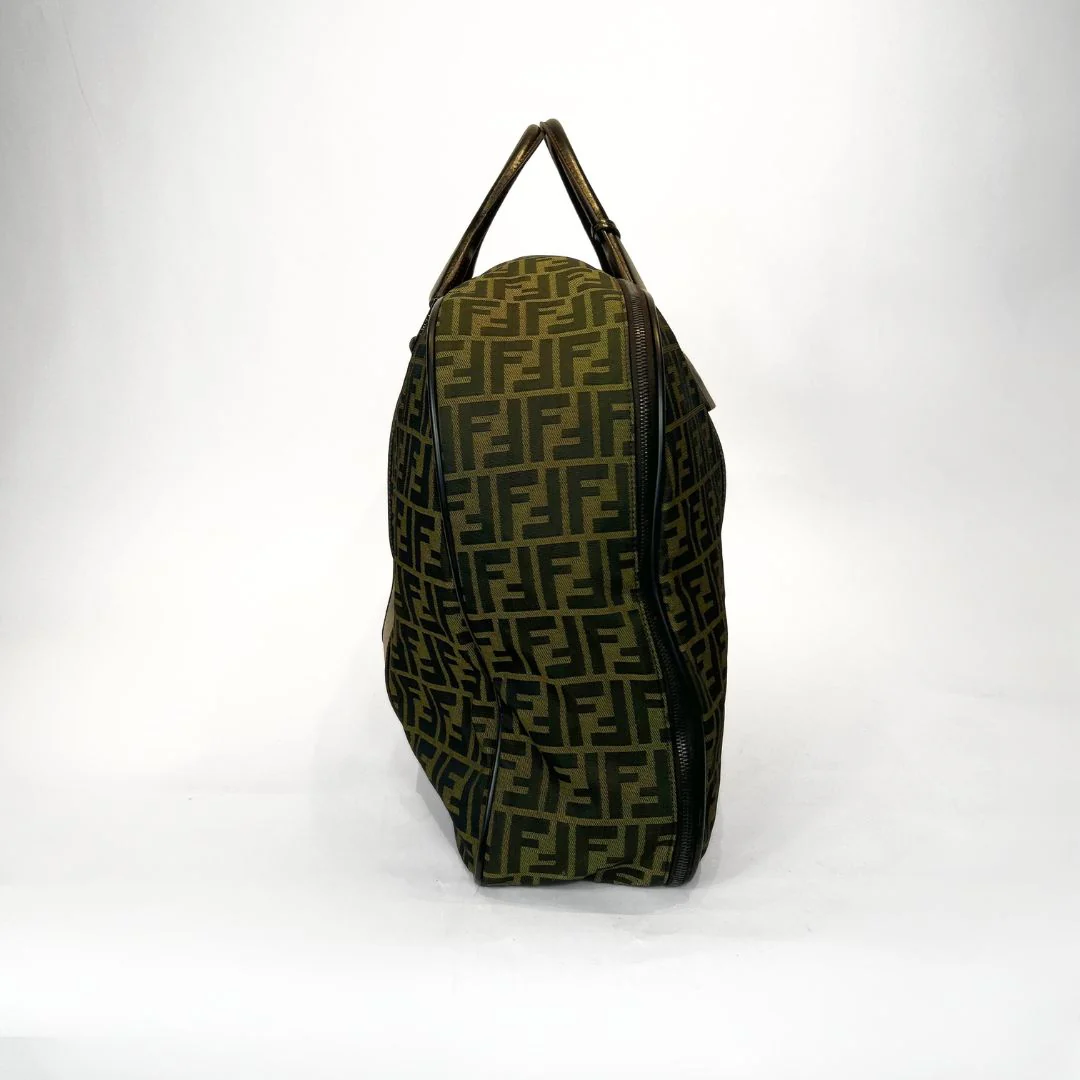 Green patterned bag with a handle on a white background