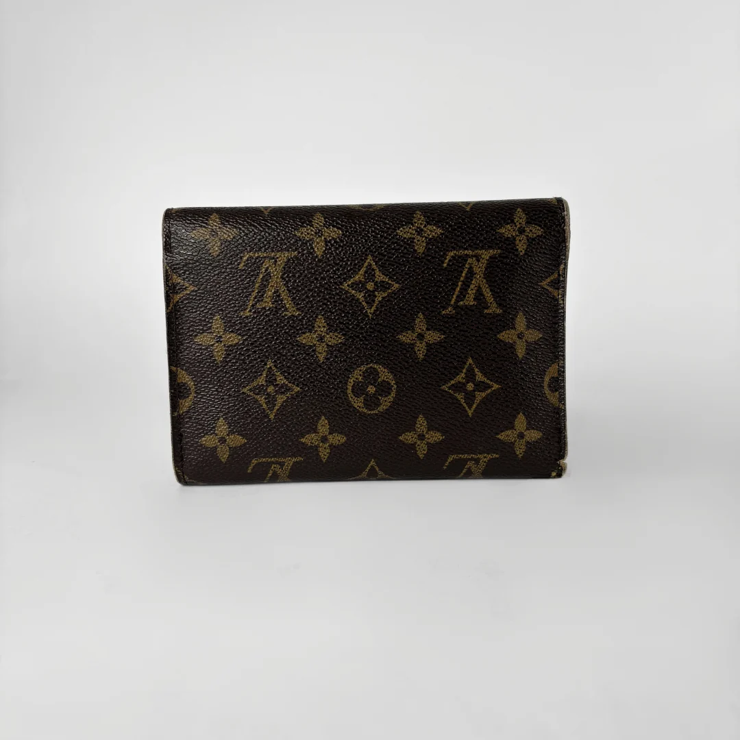Louis Vuitton International Wallet Medium on a white background