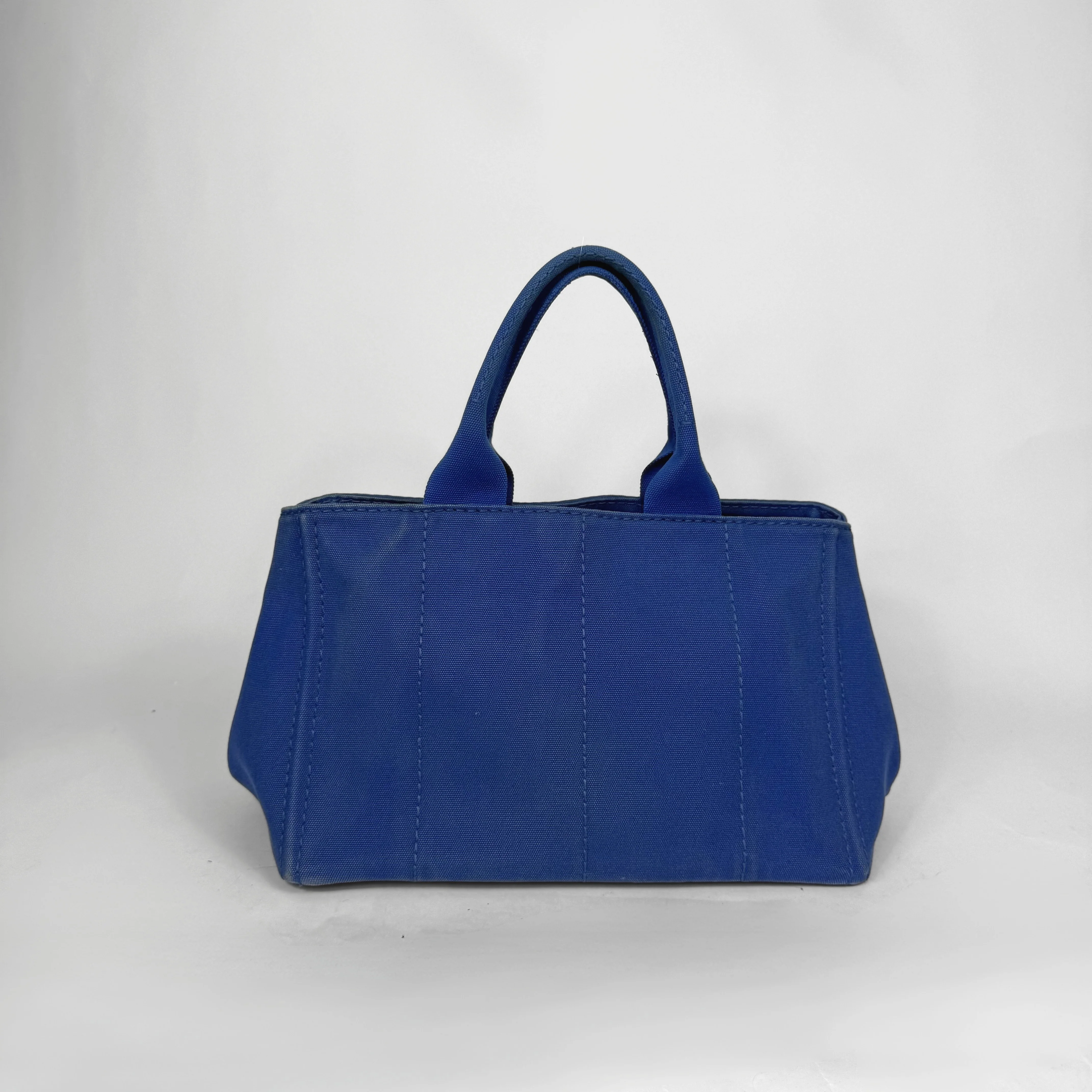 Blue handbag on a white background