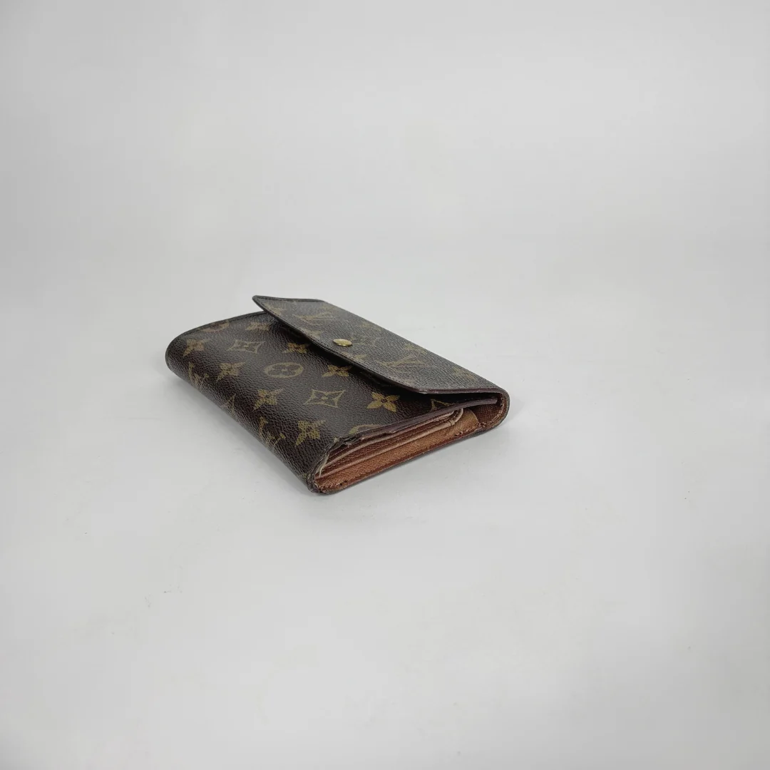 Louis Vuitton Wallet International on a white background