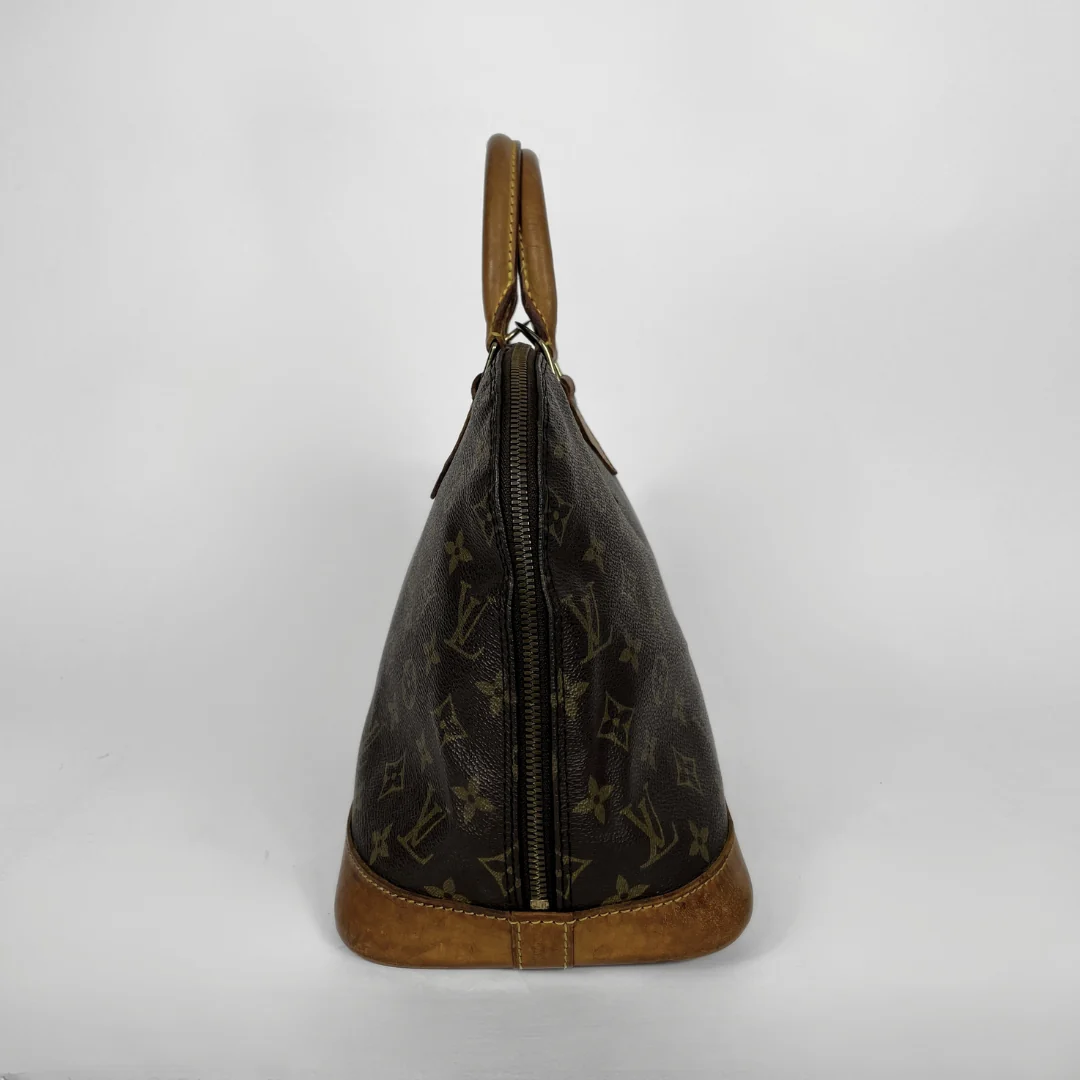 Louis Vuitton Alma Monogram Canvas on a white background