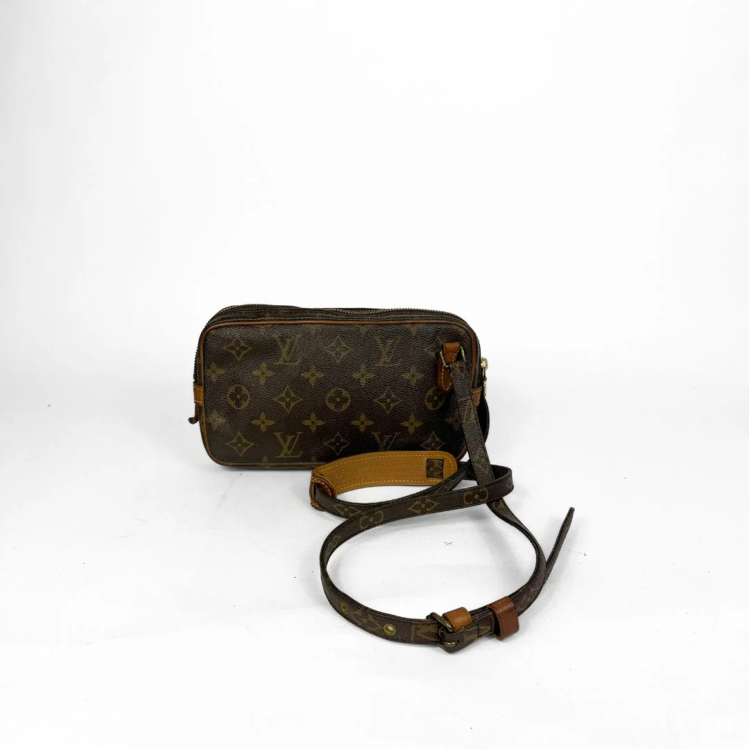 Brown monogram handbag with a strap on a white background