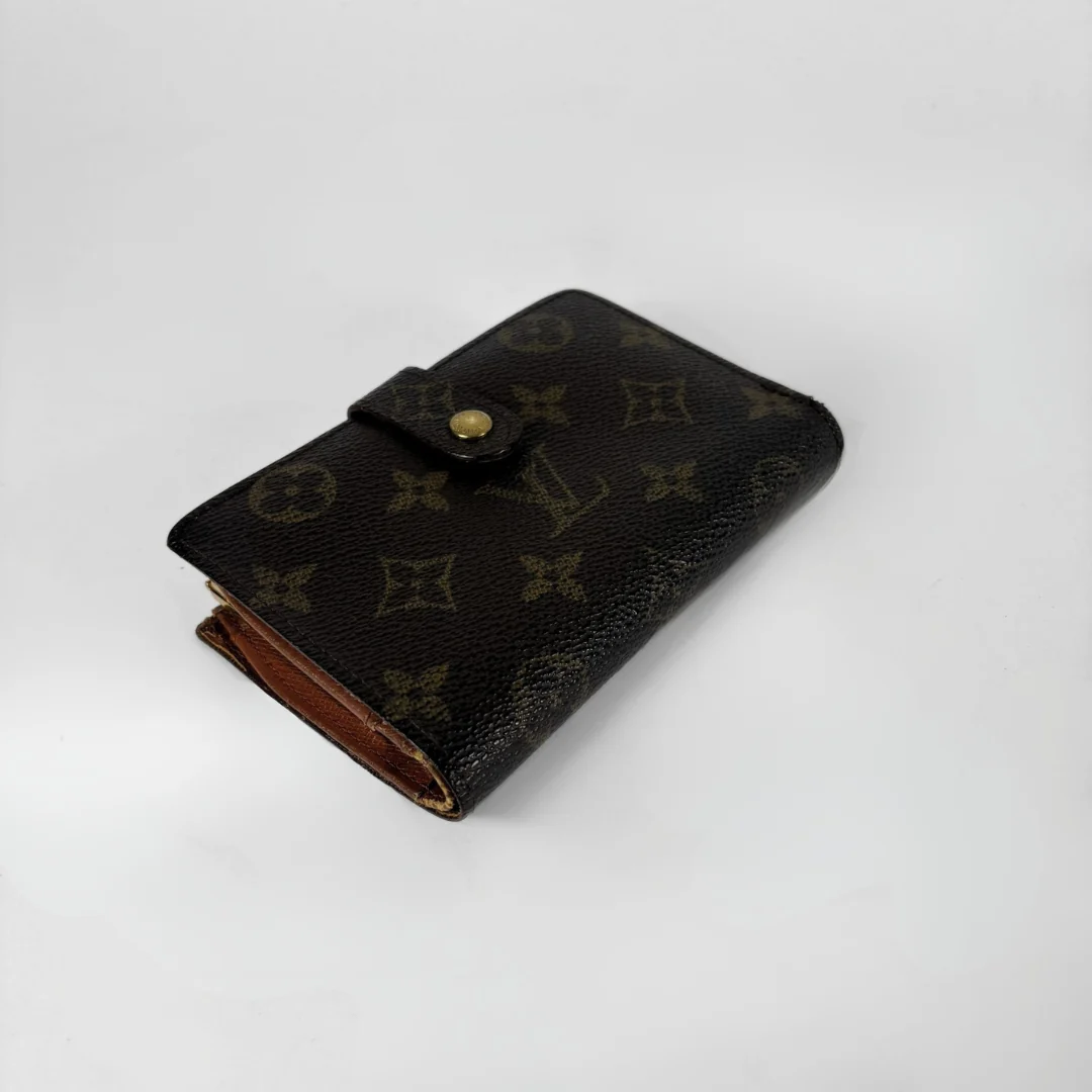 Louis Vuitton Monogram Clip Wallet on a white background