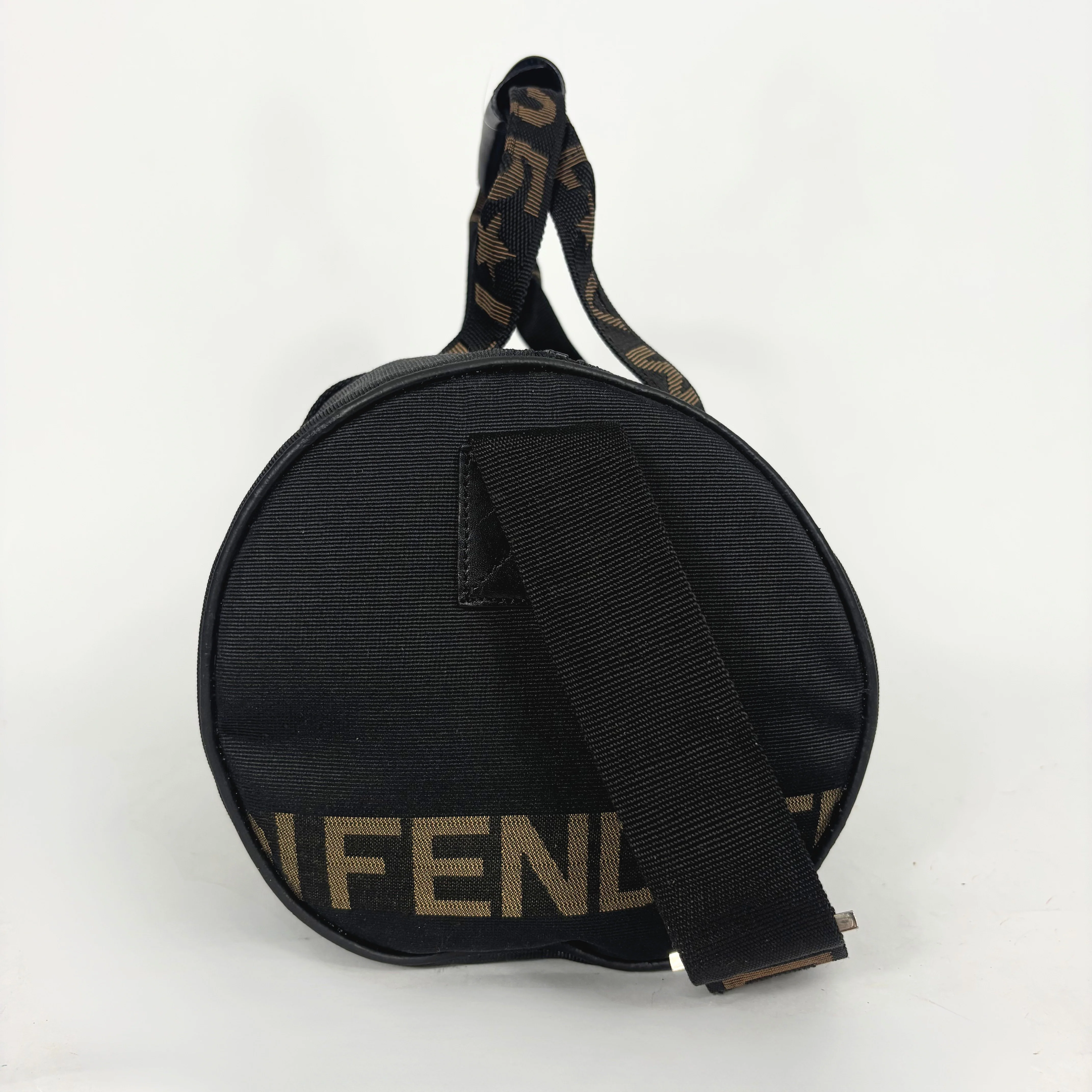 Black bag with a strap on a white background