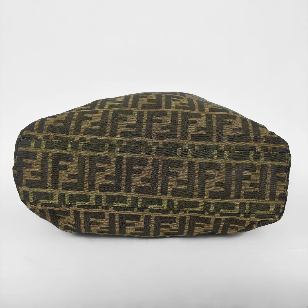 Fendi shopper bag in brown and black Zucca monogram canvas with black leather handles.