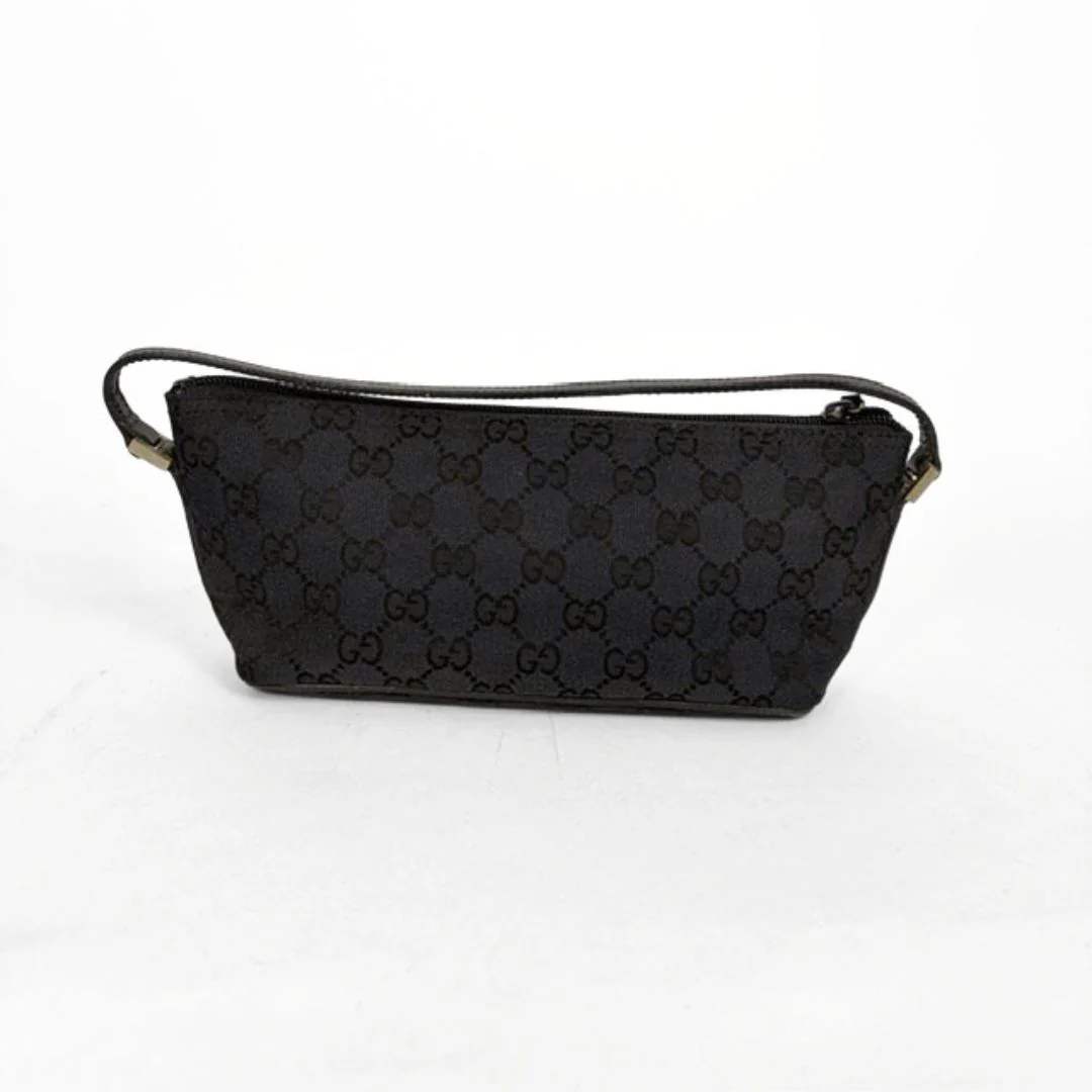 Black patterned handbag on a white background