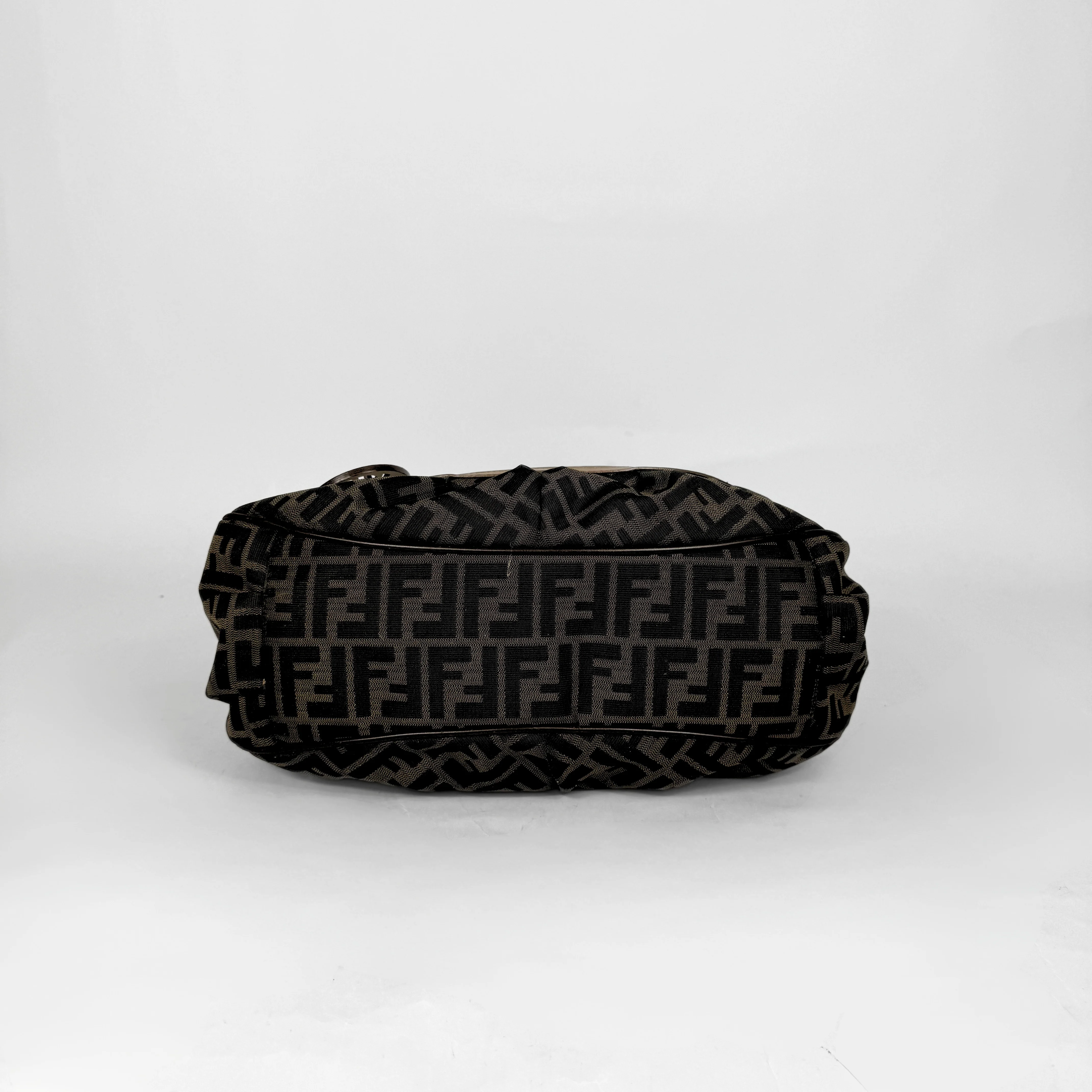 Fendi Zucca monogram canvas shoulder bag with letaher trim and a large white cicular FENDI charm.